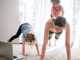 mom working out with kids at home